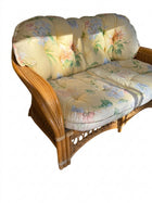 Vintage Rattan Wicker Loveseat Floral Cushions - Image 1