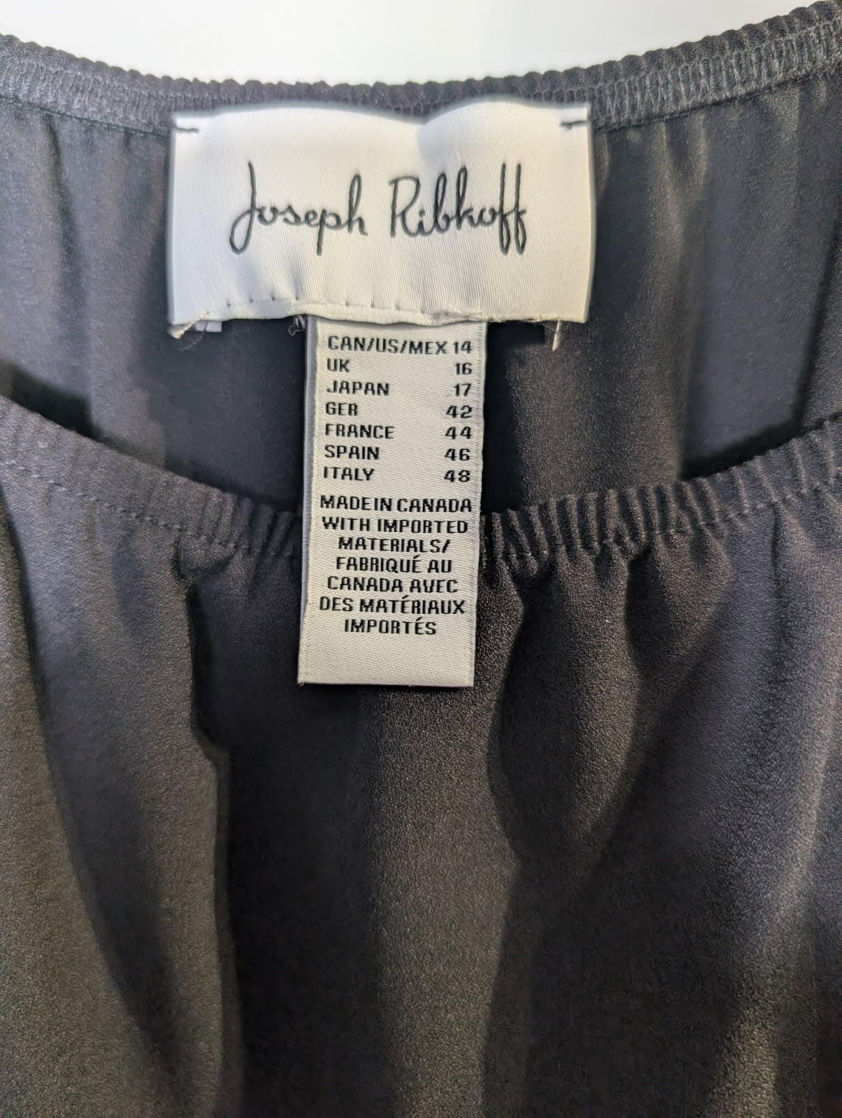 Joseph Ribkoff Black Mesh Sleeve Blouse with Circular Appliqué - Image 3