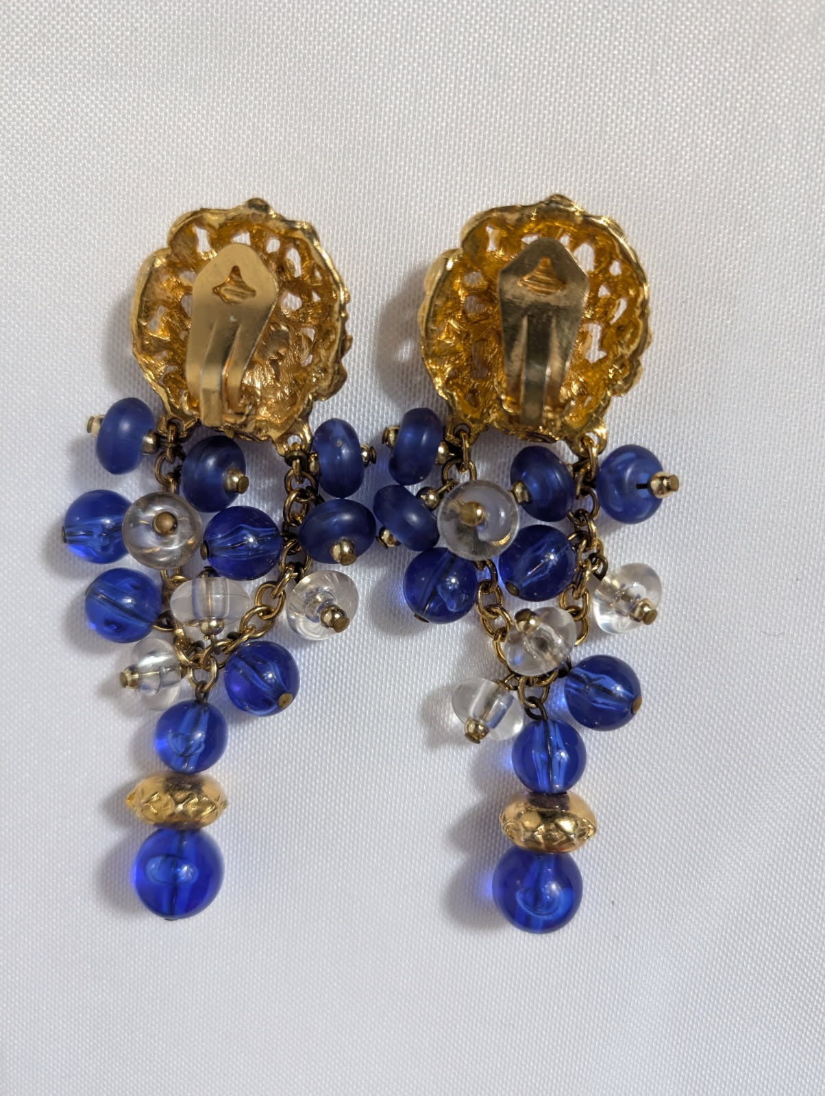 Vintage Gold-Tone Textured Clip-On Earrings With Blue And Clear Bead Dangles - Image 2