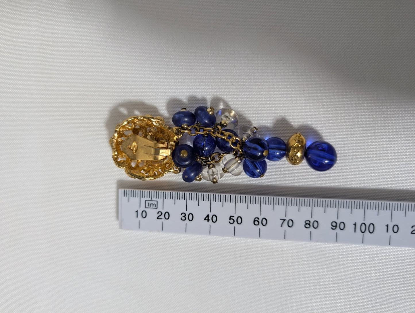 Vintage Gold-Tone Textured Clip-On Earrings With Blue And Clear Bead Dangles - Image 3