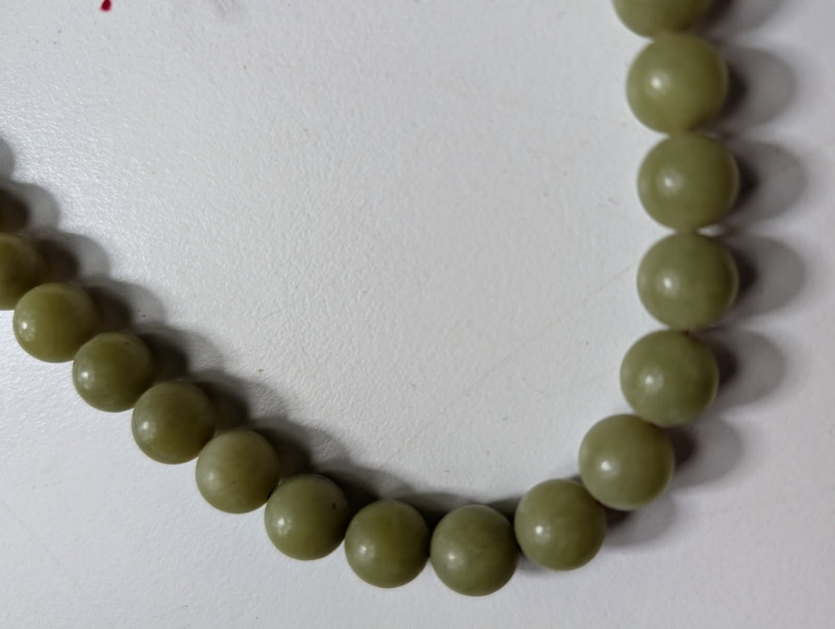 Traditional Green Bead Prayer Mala With Red Silk Tassels - Image 4