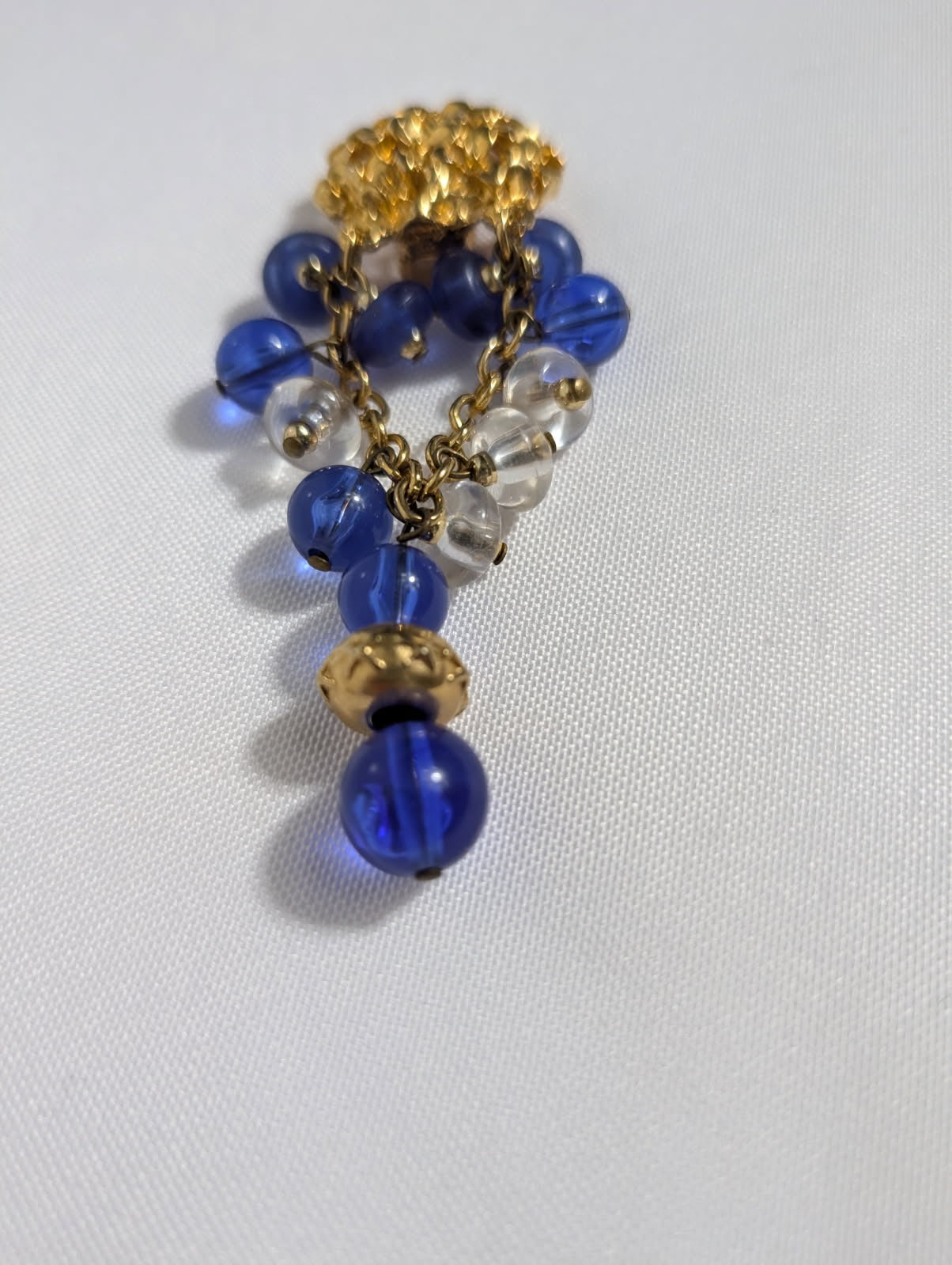 Vintage Gold-Tone Textured Clip-On Earrings With Blue And Clear Bead Dangles - Image 4