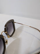 Miu Miu SMU 07O Sunglasses Black Gradient Gold Frame - Image 6