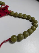 Traditional Green Bead Prayer Mala With Red Silk Tassels - Image 6