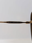 Miu Miu SMU 07O Sunglasses Black Gradient Gold Frame - Image 8
