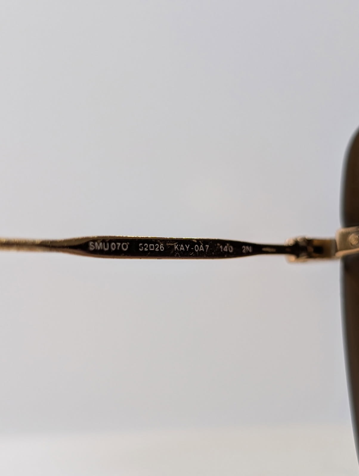 Miu Miu SMU 07O Sunglasses Black Gradient Gold Frame - Image 8